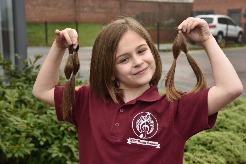 Main image for Ava loses her locks for charity