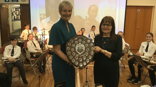 Main image for Recently-retired headteacher scoops award