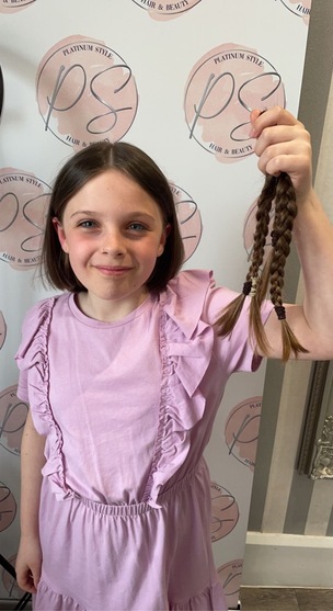 CHARITY HAIR CUT: Amelia Hepplestone had ten inches of her hair cut last weekend and will donate the hair to a children’s charity.