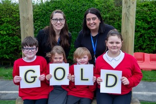 WELLGATE GOLD: Staff and pupils  celebrate Gold award, for achieving the highest standards for Anti-Bullying in the school system. Picture Shaun Colborn PD093065