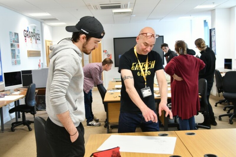 Fine art student Archie Busby with comic-book artist Dean Ormston.