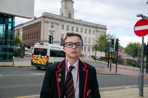 FOUNTAIN OF GLASS: 11 years old Nertil Meci who cut his foot on Glass discarded at the Town Hall fountains. Picture Shaun Colborn PD093083