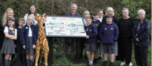 Pupils play their part in village history board Image