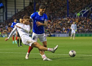 Reds stunned by two late Pompey goals in loss Image