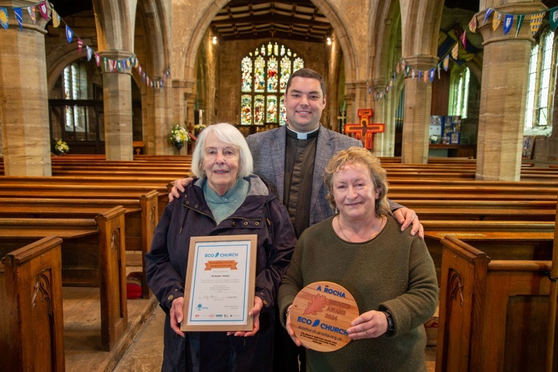 ECO—CHURCH: Fthr Tim Stevens with members of the congregation who helped to reach a bronze eco award for All Saints church Darton. Picture Shaun Colborn PD093060