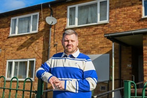 FED UP: Coun Jake Lodge outside a long-term empty ‘void’ home in his ward. Picture: Charley Atkins.