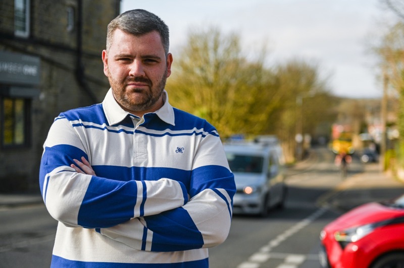 ACTION NEEDED: Coun Jake Lodge at the crossroads in Worsbrough Dale. Picture: Charley Atkins.