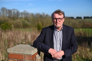 ANNOYED: Coun Andy Waters is pictured where the houses once stood. Picture: Charley Atkins.