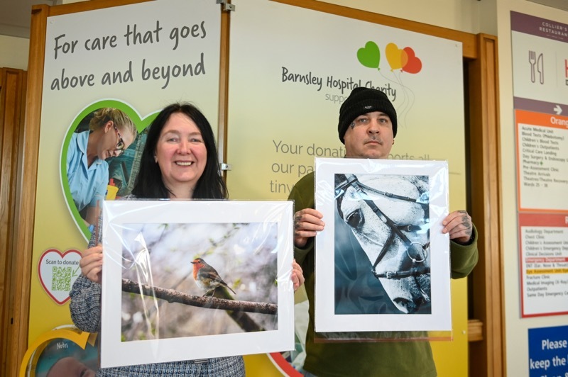 DONATION: Jane Mills with Darren Green.