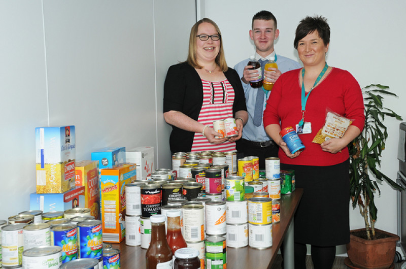 Main image for Staff donate collection to foodbank