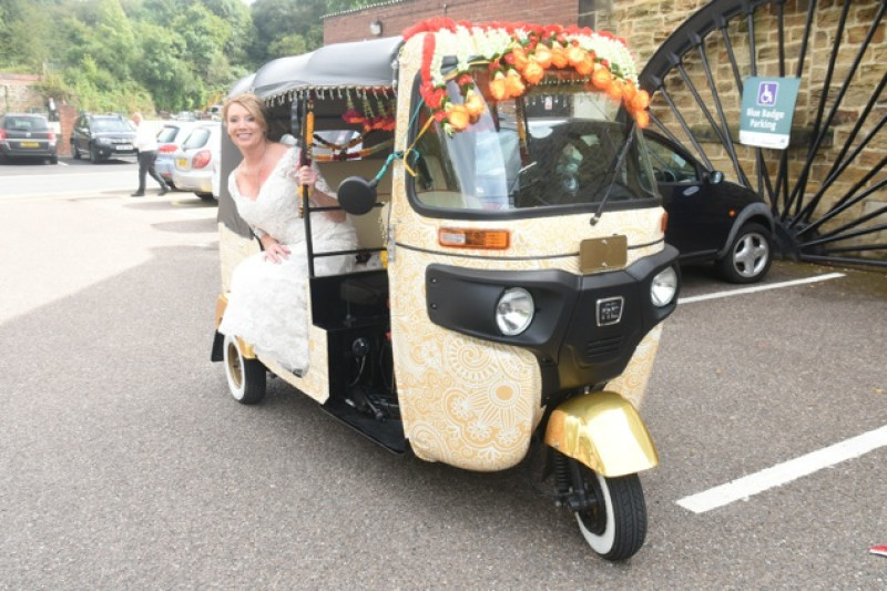 Main image for Bride arrives at wedding in style