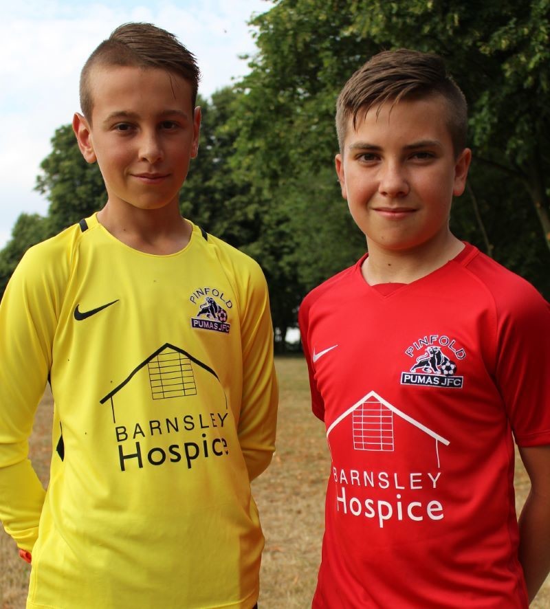Main image for Young football team wear Barnsley Hospice shirts close to their hearts