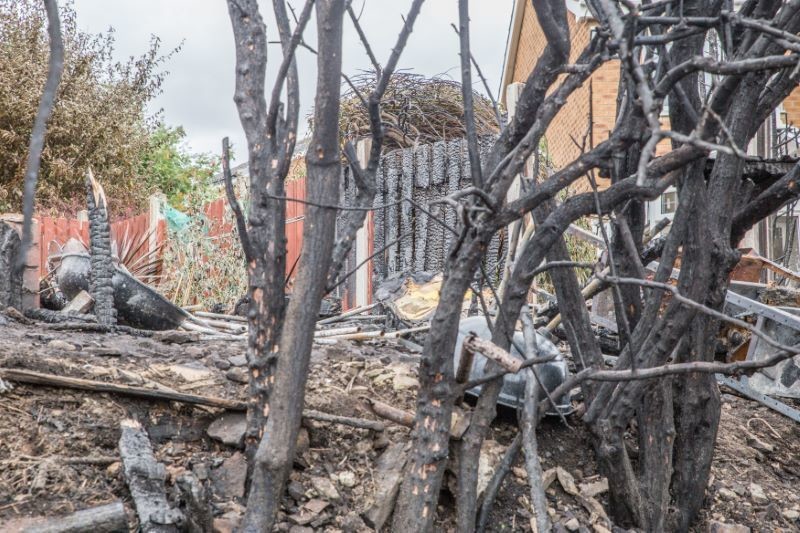 Main image for Brave residents fight flames as blaze spreads from field