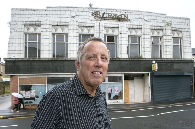 Burton Building: A Landmark building in Wombwell that has been closed for over 11 years could re-open subject to a council bid, Coun Robert Frost outside Burton’s on Wombwell high street. Picture Shaun Colborn PD092398