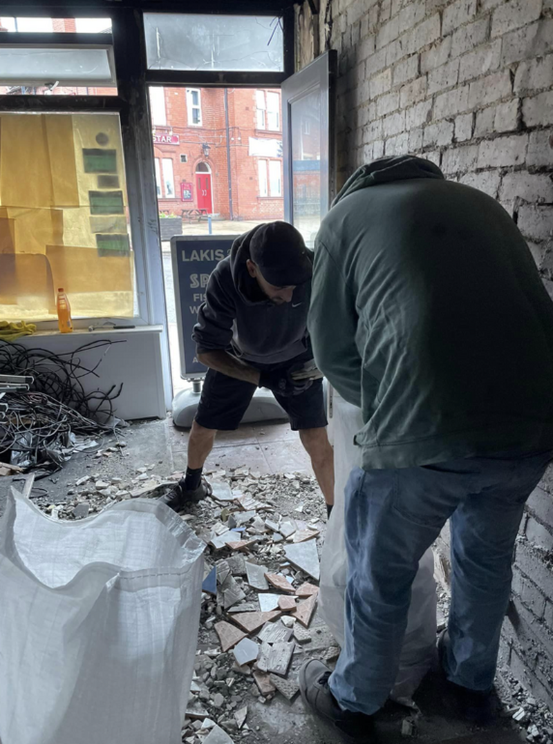 CLEAN-UP: Work begins to restore Laki’s Fish Bar back to its former glory.