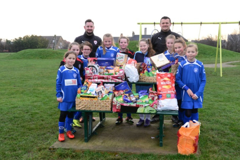 Main image for Barnsley Ladies collect food donations
