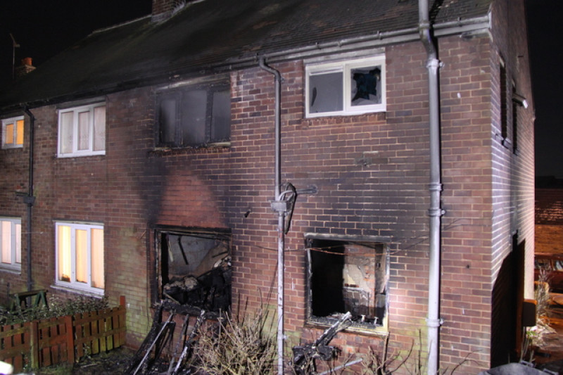 Main image for Men escape Pilley house blaze
