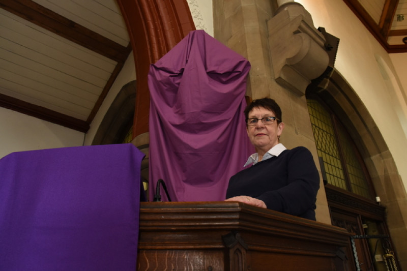 Main image for Spooky face appears in church drapes