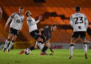 Liam Kitching in action at Port Vale in the EFL Trophy