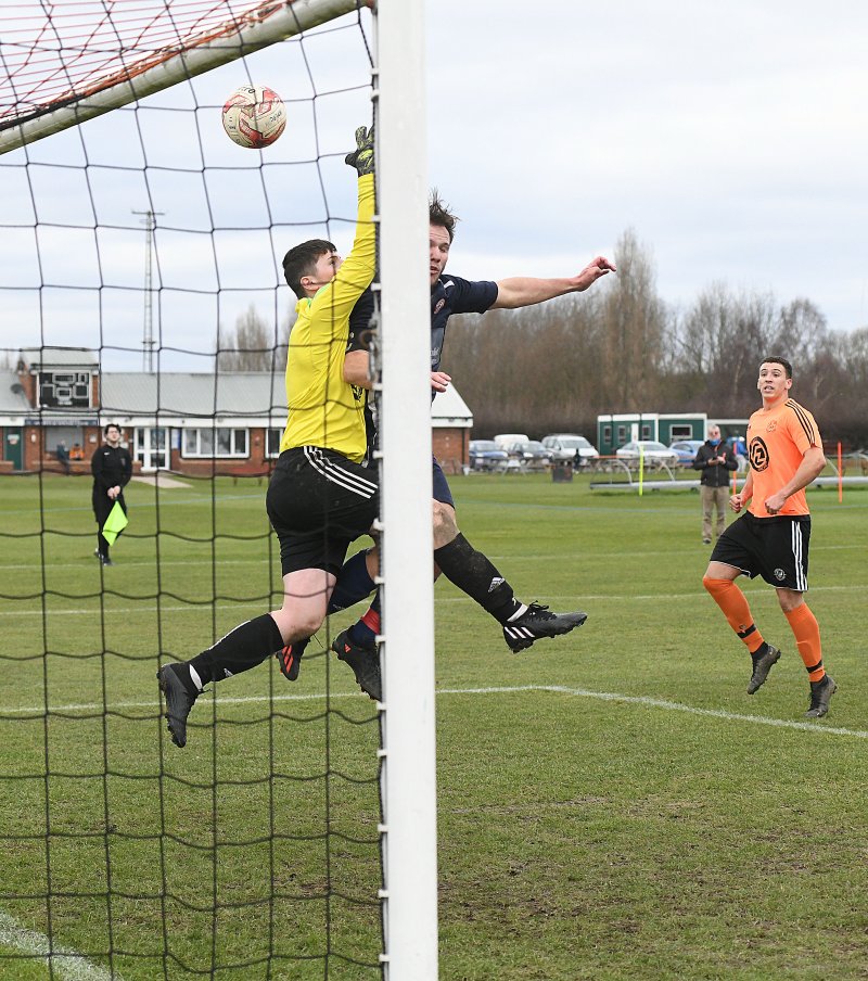 Action from Wombwell Town's win at Houghton Main