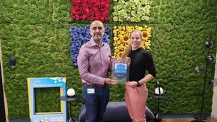 Barnsley College Director of IT Azhar Iqbal and Digital Innovation Team Leader Abby Parkin with the Microsoft Showcase College award.