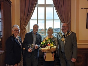 John and wife Carol Higgins receiving gifts from Mayor Mick Stowe and Mayoress Elaine Stowe to thank them for helping Barnsley Civic Choir over the last 38 years.