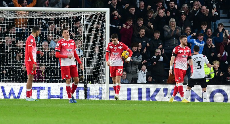 Barnsley react to a goal in their 3-0 loss at Derby in November