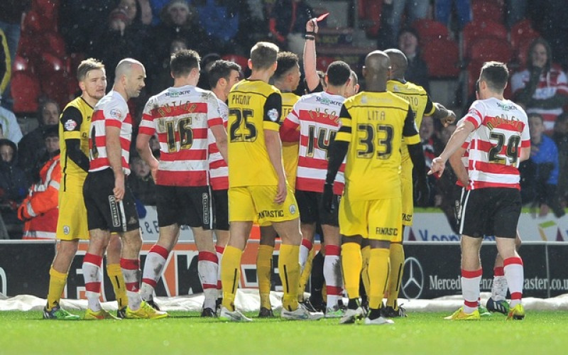 Main image for Holgate sent off as Reds suffer late loss at Doncaster
