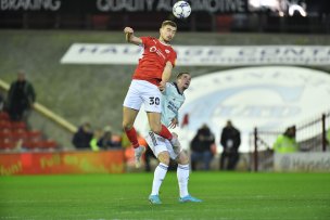 Max Watters with Michal Helik at Oakwell last year