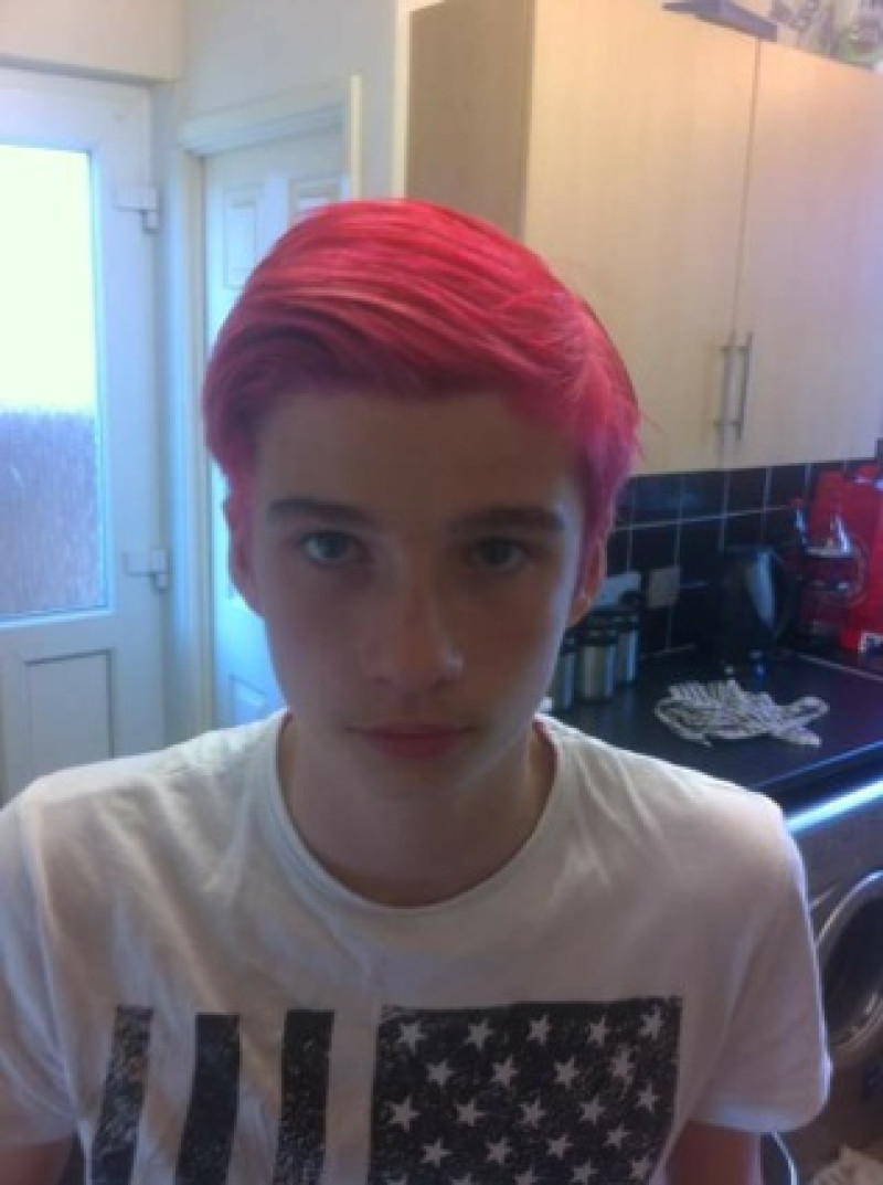 Main image for Lad dyes hair pink for cancer charity
