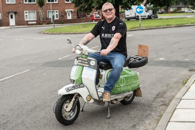 Main image for Micks scoots off and raises charity cash