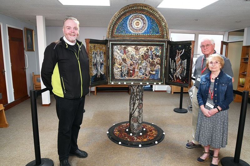 LITTLE BITS OF GOD: Fr. Declan JK Brett and Jim and Pat Harte show off the magnificent collection of  Religious Mosaics on display at St Michael and All Angels Catholic Church in Wombwell,   Pic by Wes Hobson, PD092328.