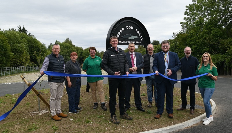 PYLON CLEAR: Councillor James Higginbottom and CEO of the Peak District National Park Philip Mulligan cut the tape to announce the changes at Dunford Bridge.  Picture: Wes Hobson.  PD092321.