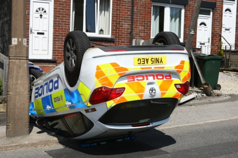 Main image for Police car tumble blamed on hot weather