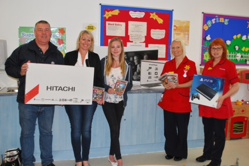 Main image for Hospital patients receive gifts after charity bike ride