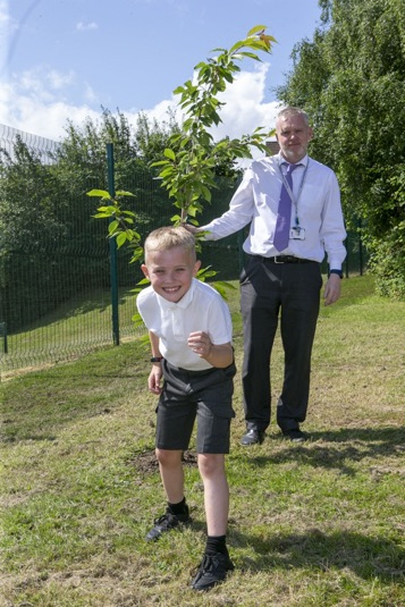 Fundraiser: Theo Pierrepont and teacher Mathew Graham who have run to raise money for the family of the polish children who died recently. picture Shaun Colborn PD092284