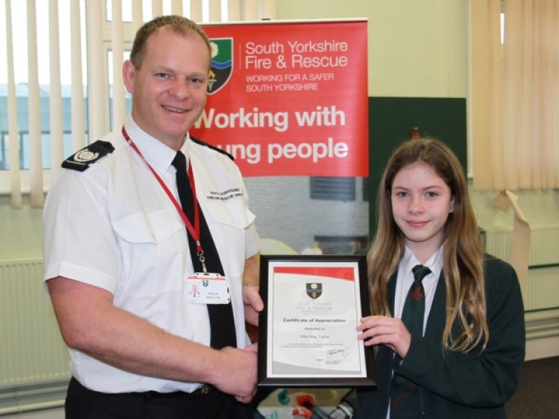 Main image for Girl given bravery award for saving family from blaze