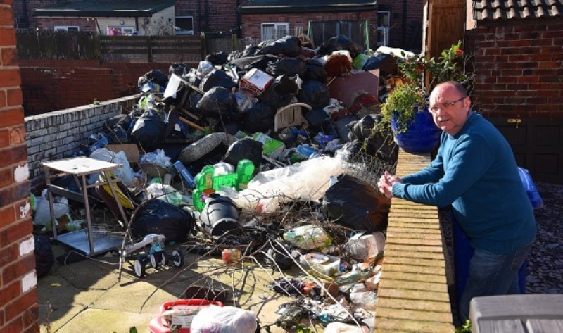 Main image for Resident hits out at fly-tipping garden
