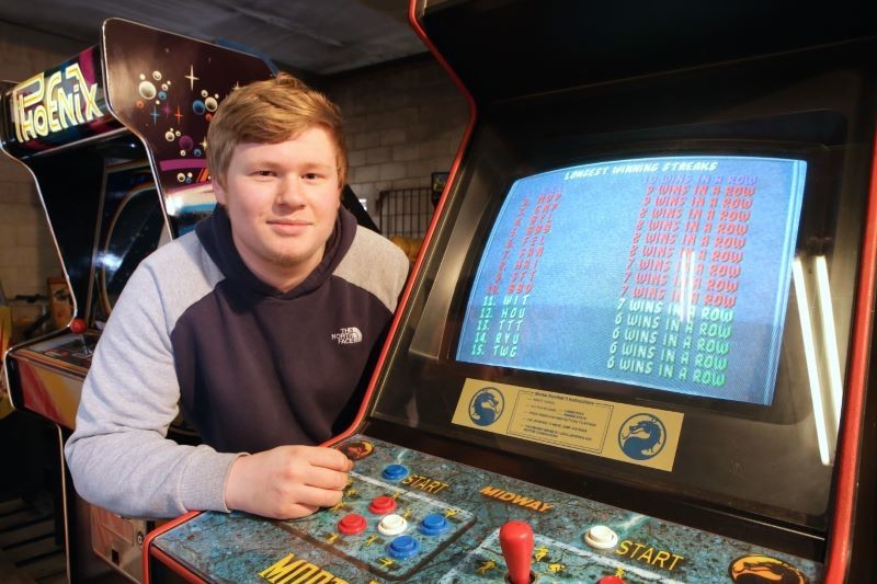 Main image for Chris not playing around with retro games arcade