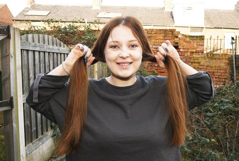 HAIR WE GO: Ready to donate her locks for charity is Natalie Hughes.  Picture: Wes Hobson.  PD091907.