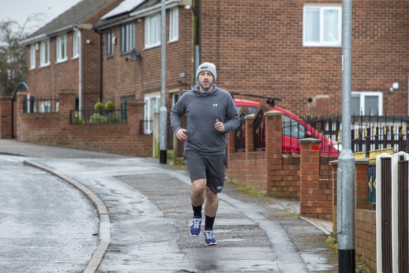 Running for Grandad: Jordan Zaszlos has set out to run 2 miles a day throughout March to raise funds for Rosehill care home Dodworth. Picture Shaun Colborn  PD091941