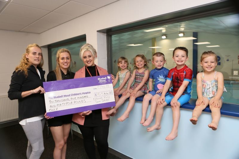 Main image for Swimmers splash the cash for hospice