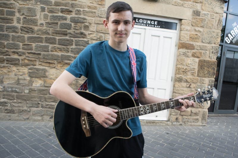 Main image for Young guitarist Sam commended