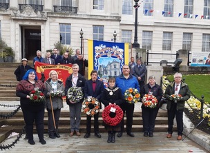 COMMEMORATION: Residents at the town hall last week to remember those who have lost their life at work.