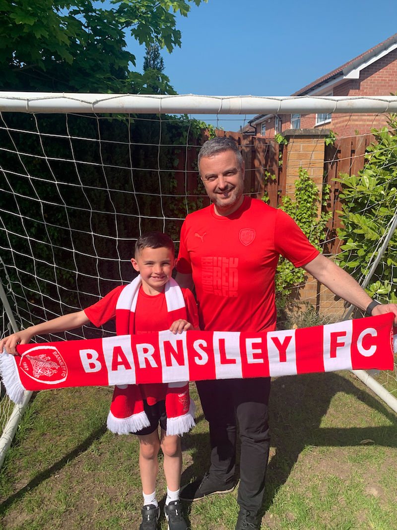 BONKERS: Matt Wood and his eight-year-old son Hartley will travel almost 1,000 miles to watch the Reds at Wembley.