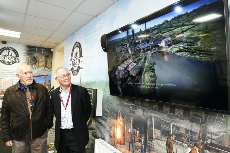 BRILLIANT RECREATION: Councillors Tim Shepherd and Robin Franklin at the display at the Elsecar Heritage Centre.  Picture: Wes Hobson.  PD092169.