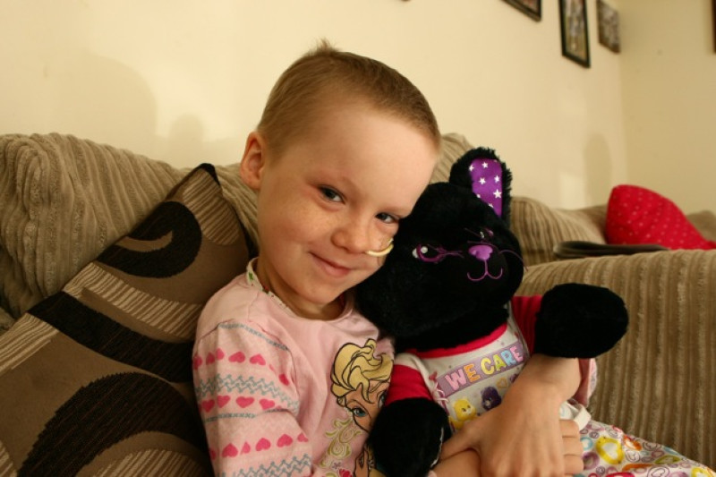 Main image for Little girl still smiling through cancer treatment