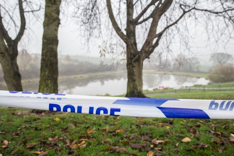 Main image for Police investigate after body is found in pond