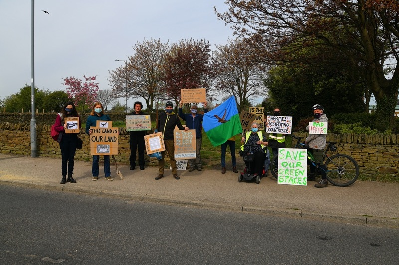 NOT HAPPY: Protesters gather at the Hoyland Common site. PD089866