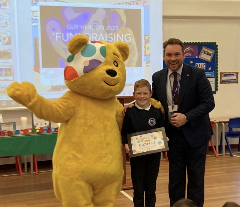 SUCCESS: Guy is pictured alongside Pudsey and headteacher Adam Bramall.